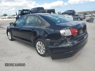 2012 Volkswagen Jetta SE with VIN 3VWDX7AJ3CM338441, listed as a Copart auction lot 60853055 with 151,075 mi miles and Salvage title. Bid and sale history available at DreamBid. Image 2.