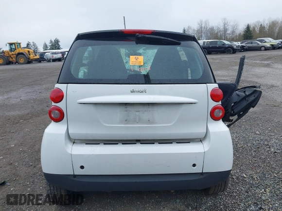 2012 Smart fortwo Pure z VIN WMEEJ3BA3CK573365, wystawiony jako IAAI lot #41910721 z przebiegiem Nie podano mil oraz . Historia ofert i sprzedaży dostępna na DreamBid. Obrazek 16.