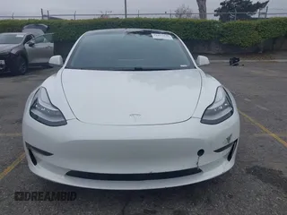 2020 Tesla Model 3 Long Range with VIN 5YJ3E1EB0LF803217, listed as a IAAI auction lot 41871940 with 130,391 mi miles. Bid and sale history available at carsss.com. Image 12.