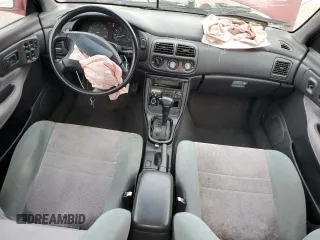1996 Subaru Impreza with VIN JF1GC4557TH512593, listed as a Copart auction lot 74099464 with 112,437 mi miles and Salvage title. Bid and sale history available at DreamBid. Image 8.