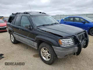2000 Jeep Grand Cherokee Laredo with VIN 1J4GW48S2YC336733, listed as a Copart auction lot 54553315 with 284,402 mi miles and Non repairable. Bid and sale history available at DreamBid. Image 4.