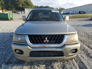 2002 Mitsubishi Montero Limited z VIN JA4LS41R32J066917, wystawiony jako Copart lot #71118894 z przebiegiem 185 475 mil mil oraz Szkody całkowita. Historia ofert i sprzedaży dostępna na DreamBid. Obrazek 5.