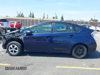 2015 Toyota Prius Four with VIN JTDKN3DU7F1954675, listed as a IAAI auction lot 42100832 with 182,339 mi miles. Bid and sale history available at carsss.com. Image 14.