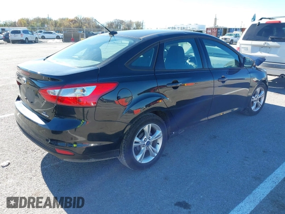 2013 Ford Focus SE with VIN 1FADP3F27DL183804, listed as a IAAI auction lot 40899670 with 66,352 mi miles. Bid and sale history available at carsss.com. Image 4.