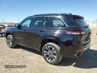 2023 Jeep Grand Cherokee Overland z VIN 1C4RJHDG4PC516719, wystawiony jako Copart lot #73334034 z przebiegiem 6 306 mil mil oraz Szkoda całkowita • Salvage title. Historia ofert i sprzedaży dostępna na DreamBid. Obrazek 2.