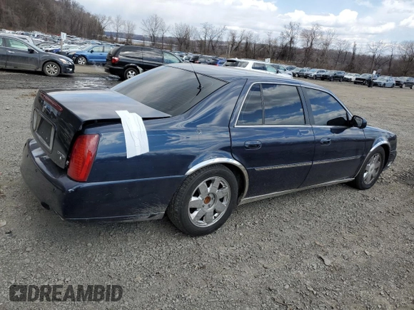2004 Cadillac DeVille DTS z VIN 1G6KF579X4U203102, wystawiony jako Copart lot #50426955 z przebiegiem 157 290 mil mil oraz Szkody całkowita. Historia ofert i sprzedaży dostępna na DreamBid. Obrazek 3.