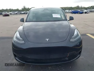 2024 Tesla Model Y z VIN 7SAYGDED3RF041788, wystawiony jako IAAI lot #42644453 z przebiegiem 22 189 mil mil oraz . Historia ofert i sprzedaży dostępna na DreamBid. Obrazek 12.