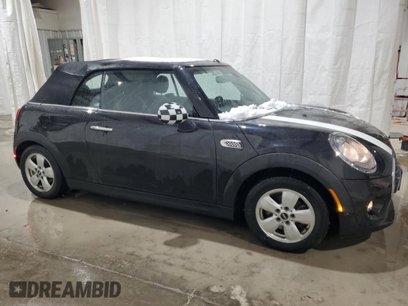 2017 MINI Convertible Cooper with VIN WMWWG5C36H3C99710, listed as a Copart auction lot 89058985 with 49,934 mi miles and Salvage title. Bid and sale history available at DreamBid. Image 4.