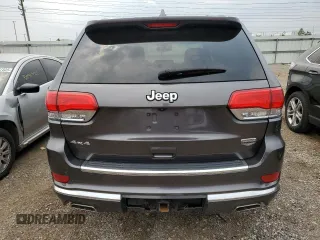 2014 Jeep Grand Cherokee Summit с VIN 1C4RJFJG6EC500348, выставлен на аукционе Copart как лот 59166275 с пробегом 104 623 миль миль и Списание • Salvage title. История ставок и продаж доступна на DreamBid. Изображение 6.