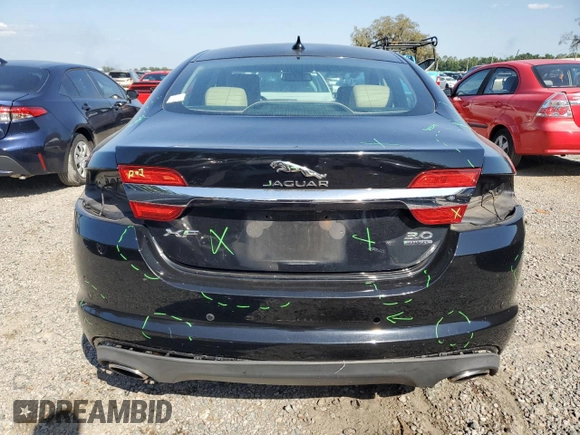2015 Jaguar XF V6 Portfolio with VIN SAJWJ0FFXF8U60040, listed as a Copart auction lot 52912695 with 112,618 mi miles and Salvage Title. Bid and sale history available at carsss.com. Image 6.