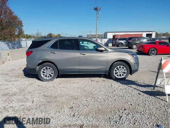 2018 Chevrolet Equinox LT z VIN 3GNAXSEV7JS621706, wystawiony jako IAAI lot #40760827 z przebiegiem 36 051 mil mil oraz . Historia ofert i sprzedaży dostępna na DreamBid. Obrazek 13.