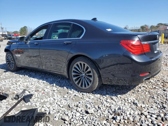 2012 BMW 7 Series 740i with VIN WBAKA4C58CC613763, listed as a Copart auction lot 43557415 with 0 mi miles and Salvage Title. Bid and sale history available at carsss.com. Image 2.
