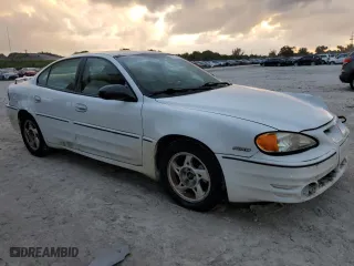2004 Pontiac Grand Am GT with VIN 1G2NW52E34M636201, listed as a Copart auction lot 79112994 with 108,409 mi miles and Salvage Title. Bid and sale history available at carsss.com. Image 4.