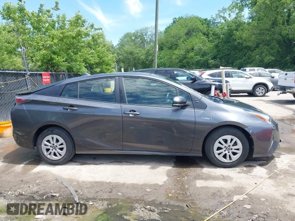 2016 Toyota Prius Two z VIN JTDKBRFU2G3014010, wystawiony jako IAAI lot #42254617 z przebiegiem 171 521 mil mil oraz . Historia ofert i sprzedaży dostępna na DreamBid. Obrazek 13.