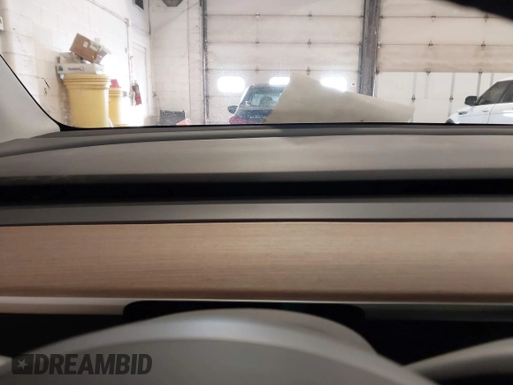 2021 Tesla Model Y Long Range with VIN 5YJYGDEE2MF185945, listed as a IAAI auction lot 41599029 with 53,815 mi miles and . Bid and sale history available at DreamBid. Image 7.