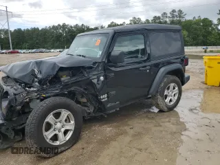 2018 Jeep Wrangler Sport S with VIN 1C4GJXAG9JW242302, listed as a Copart auction lot 51935785 with 82,395 mi miles and Salvage title. Bid and sale history available at DreamBid. Image 1.