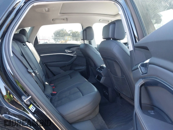2019 Audi e-tron Premium Plus with VIN WA1LAAGE9KB021724, listed as a IAAI auction lot 41643596 with 34,804 mi miles. Bid and sale history available at carsss.com. Image 8.