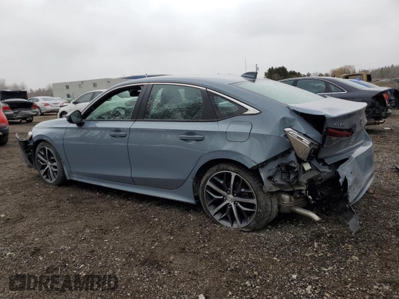2023 Honda Civic Touring z VIN 2HGFE1F93PH002825, wystawiony jako Copart lot #52773065 z przebiegiem 20 659 mil mil oraz Szkoda całkowita • Salvage title. Historia ofert i sprzedaży dostępna na DreamBid. Obrazek 2.