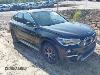 2016 BMW X1 xDrive28i z VIN WBXHT3C37GP888848, wystawiony jako IAAI lot #42425647 z przebiegiem 88 396 mil mil oraz . Historia ofert i sprzedaży dostępna na DreamBid. Obrazek 1.