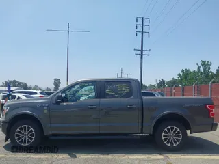 2018 Ford F-150 XL with VIN 1FTEW1CPXJKD56562, listed as a IAAI auction lot 42588371 with 137,496 mi miles and . Bid and sale history available at DreamBid. Image 14.