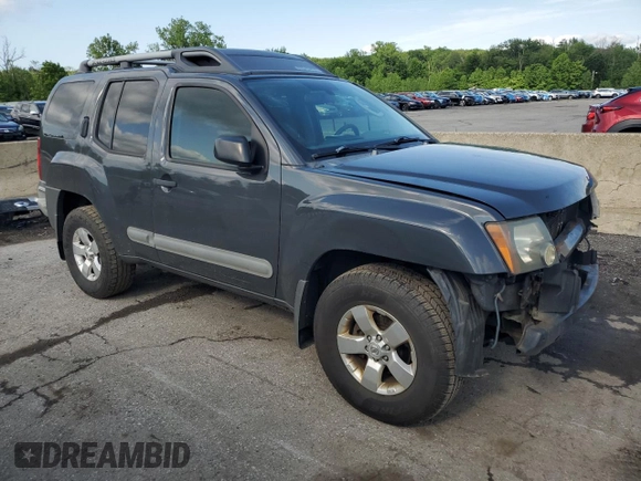 2010 Nissan Xterra S with VIN 5N1AN0NWXAC504893, listed as a Copart auction lot 60217915 with 267,954 mi miles and Salvage title. Bid and sale history available at DreamBid. Image 4.