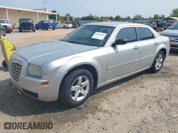 2006 Chrysler 300 with VIN 2C3KA43R96H505406, listed as a IAAI auction lot 42047014 with 257,628 mi miles. Bid and sale history available at carsss.com. Image 2.
