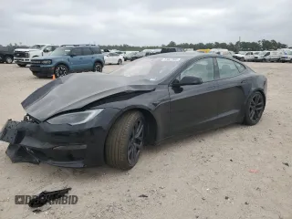 2023 Tesla Model S с VIN 5YJSA1E58PF531166, выставлен на аукционе Copart как лот 51827565 с пробегом Не указан миль и Списание • Salvage title. История ставок и продаж доступна на DreamBid. Изображение 1.