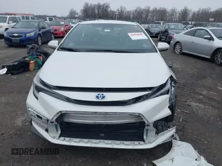 2024 Toyota Corolla Hybrid LE with VIN JTDBCMFE7RJ022109, listed as a IAAI auction lot 41131395 with 19,214 mi miles. Bid and sale history available at carsss.com. Image 12.