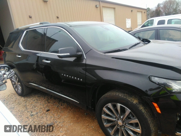 2023 Chevrolet Traverse Premier with VIN 1GNERKKW7PJ319982, listed as a IAAI auction lot 41534822 with 5,123 mi miles and . Bid and sale history available at DreamBid. Image 14.