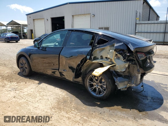 2024 Tesla Model Y z VIN 7SAYGDED2RA329802, wystawiony jako Copart lot #57748805 z przebiegiem 19 391 mil mil oraz Szkoda całkowita • Salvage title. Historia ofert i sprzedaży dostępna na DreamBid. Obrazek 2.