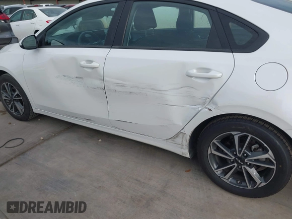 2023 Kia Forte LXS with VIN 3KPF24AD2PE602140, listed as a IAAI auction lot 42178222 with 39,421 mi miles and . Bid and sale history available at DreamBid. Image 6.