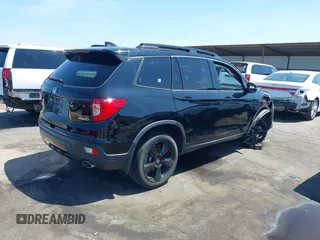 2021 Honda Passport Elite with VIN 5FNYF8H07MB003506, listed as a IAAI auction lot 42571906 with 42,323 mi miles and . Bid and sale history available at DreamBid. Image 4.
