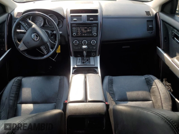 2014 Mazda CX-9 Grand Touring with VIN JM3TB3DVXE0443852, listed as a Copart auction lot 59106525 with 101,969 mi miles and Salvage title. Bid and sale history available at DreamBid. Image 8.