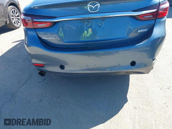 2018 Mazda 6 Grand Touring with VIN JM1GL1TY4J1333021, listed as a IAAI auction lot 41818719 with 56,188 mi miles and . Bid and sale history available at DreamBid. Image 6.