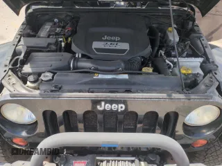 2012 Jeep Wrangler Unlimited Sahara z VIN 1C4HJWEG1CL168435, wystawiony jako Copart lot #58431615 z przebiegiem 120 364 mil mil oraz Szkoda całkowita • Salvage title. Historia ofert i sprzedaży dostępna na DreamBid. Obrazek 12.