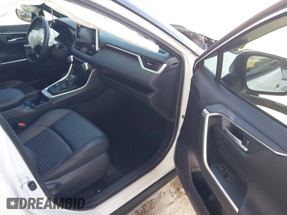 2021 Toyota RAV4 Hybrid XSE with VIN 2T3E6RFV9MW019837, listed as a IAAI auction lot 42002574 with 74,214 mi miles. Bid and sale history available at carsss.com. Image 5.