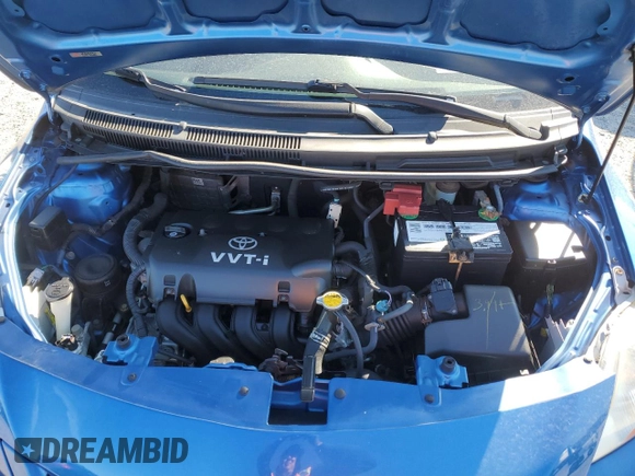 2009 Toyota Yaris with VIN JTDBT903891323833, listed as a Copart auction lot 47460975 with 134,524 mi miles and Salvage Title. Bid and sale history available at DreamBid. Image 11.
