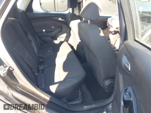 2015 Ford Focus SE with VIN 1FADP3F24FL276766, listed as a IAAI auction lot 41388348 with 59,579 mi miles. Bid and sale history available at carsss.com. Image 8.