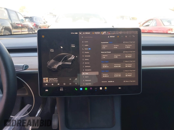 2022 Tesla Model Y Long Range z VIN 7SAYGDEE4NF522698, wystawiony jako IAAI lot #41287885 z przebiegiem 82 306 mil mil oraz . Historia ofert i sprzedaży dostępna na DreamBid. Obrazek 7.