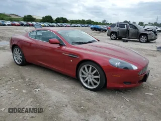 2005 Aston Martin DB9 z VIN SCFAD01A15GA00012, wystawiony jako Copart lot #65919164 z przebiegiem Nie podano mil oraz Szkody całkowita. Historia ofert i sprzedaży dostępna na DreamBid. Obrazek 4.