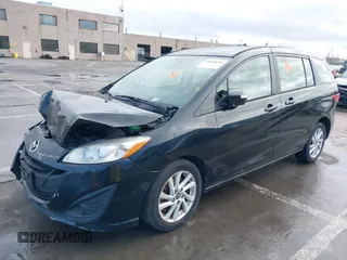 2015 Mazda 5 Sport z VIN JM1CW2BL1F0184498, wystawiony jako IAAI lot #39903933 z przebiegiem 90 905 mil mil oraz . Historia ofert i sprzedaży dostępna na DreamBid. Obrazek 2.