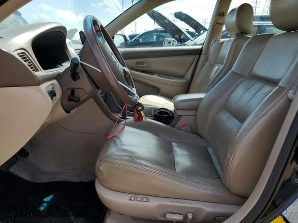 1998 Lexus ES 300 with VIN JT8BF28G3W0144816, listed as a Copart auction lot 61594275 with 179,342 mi miles and Clean title. Bid and sale history available at DreamBid. Image 7.