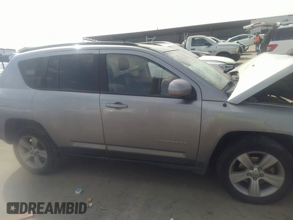 2016 Jeep Compass Latitude with VIN 1C4NJDEBXGD594149, listed as a IAAI auction lot 41523706 with 113,200 mi miles. Bid and sale history available at carsss.com. Image 14.