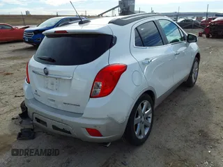 2016 Buick Encore Premium with VIN KL4CJDSB3GB607132, listed as a IAAI auction lot 41526249 with 50,617 mi miles and . Bid and sale history available at carsss.com. Image 4.