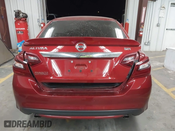 2018 Nissan Altima SR with VIN 1N4AL3AP4JC120138, listed as a IAAI auction lot 42111389 with 69,939 mi miles and . Bid and sale history available at carsss.com. Image 16.