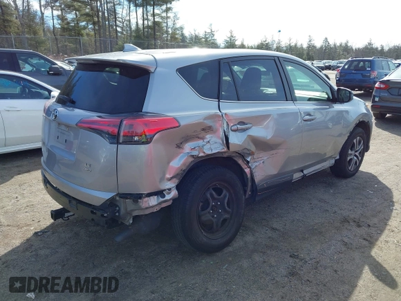 2018 Toyota RAV4 LE with VIN JTMBFREV8JJ224872, listed as a IAAI auction lot 41907962 with 104,605 mi miles and . Bid and sale history available at DreamBid. Image 4.
