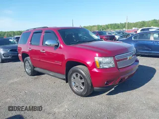 2007 Chevrolet Tahoe LTZ z VIN 1GNFK13077J294577, wystawiony jako IAAI lot #42144278 z przebiegiem 168 054 mil mil oraz . Historia ofert i sprzedaży dostępna na DreamBid. Obrazek 1.