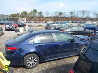 2021 Toyota Corolla Hybrid LE with VIN JTDEAMDE8MJ017192, listed as a IAAI auction lot 41669538 with 45,746 mi miles. Bid and sale history available at carsss.com. Image 13.