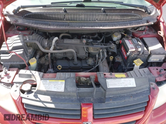 2005 Dodge Grand Caravan with VIN 2D4G944L75R310409, listed as a IAAI auction lot 41781132 with 128,120 mi miles and . Bid and sale history available at DreamBid. Image 10.
