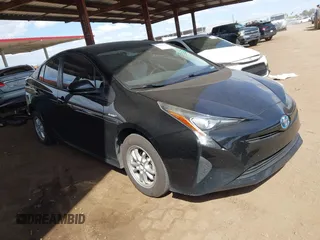 2016 Toyota Prius Two with VIN JTDKBRFUXG3503142, listed as a IAAI auction lot 42027700 with 185,319 mi miles. Bid and sale history available at carsss.com. Image 1.